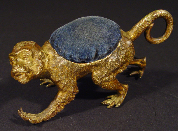 Appraisal: Large gilt bronze monkey pin cushion with velvet cushion cm