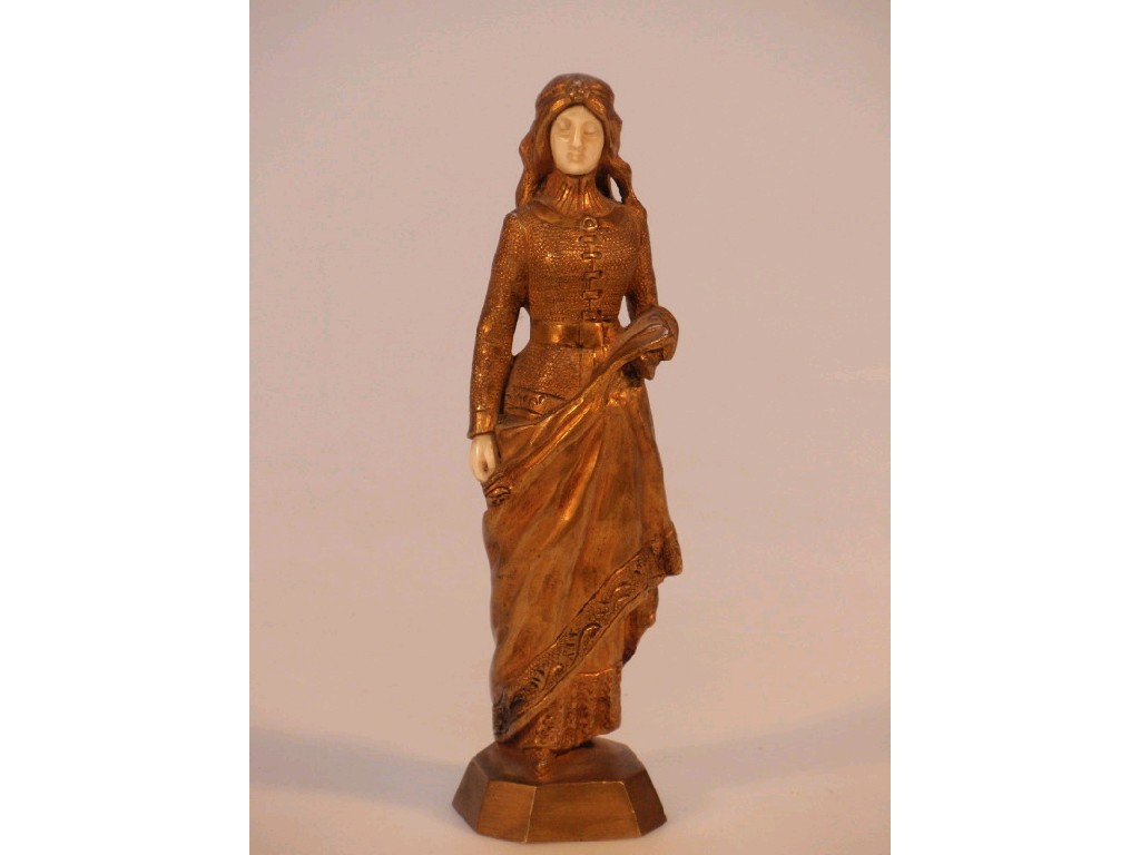 Appraisal: A gilded bronze and ivory figure of a pre Raphaelite