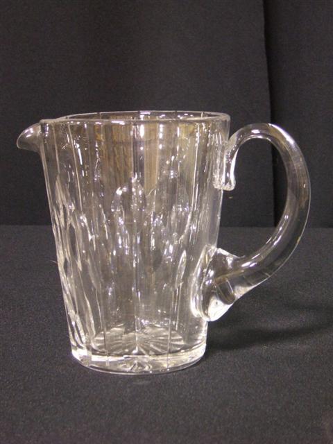 Appraisal: TAPERING GLASS WATER PITCHER Cut with stylized leaves - h