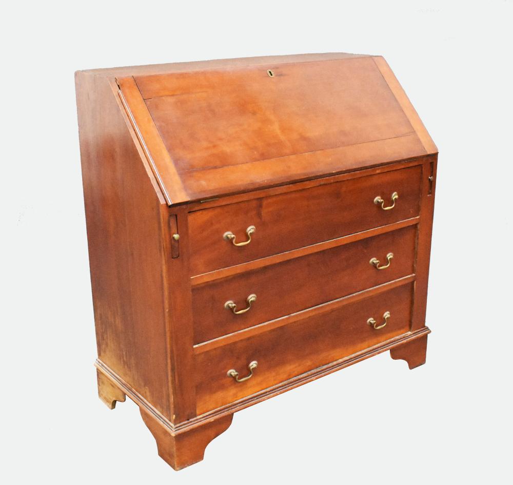 Appraisal: CHIPPENDALE CHERRYWOOD SLANT-FRONT DESK CHEST OF DRAWERS th Century The