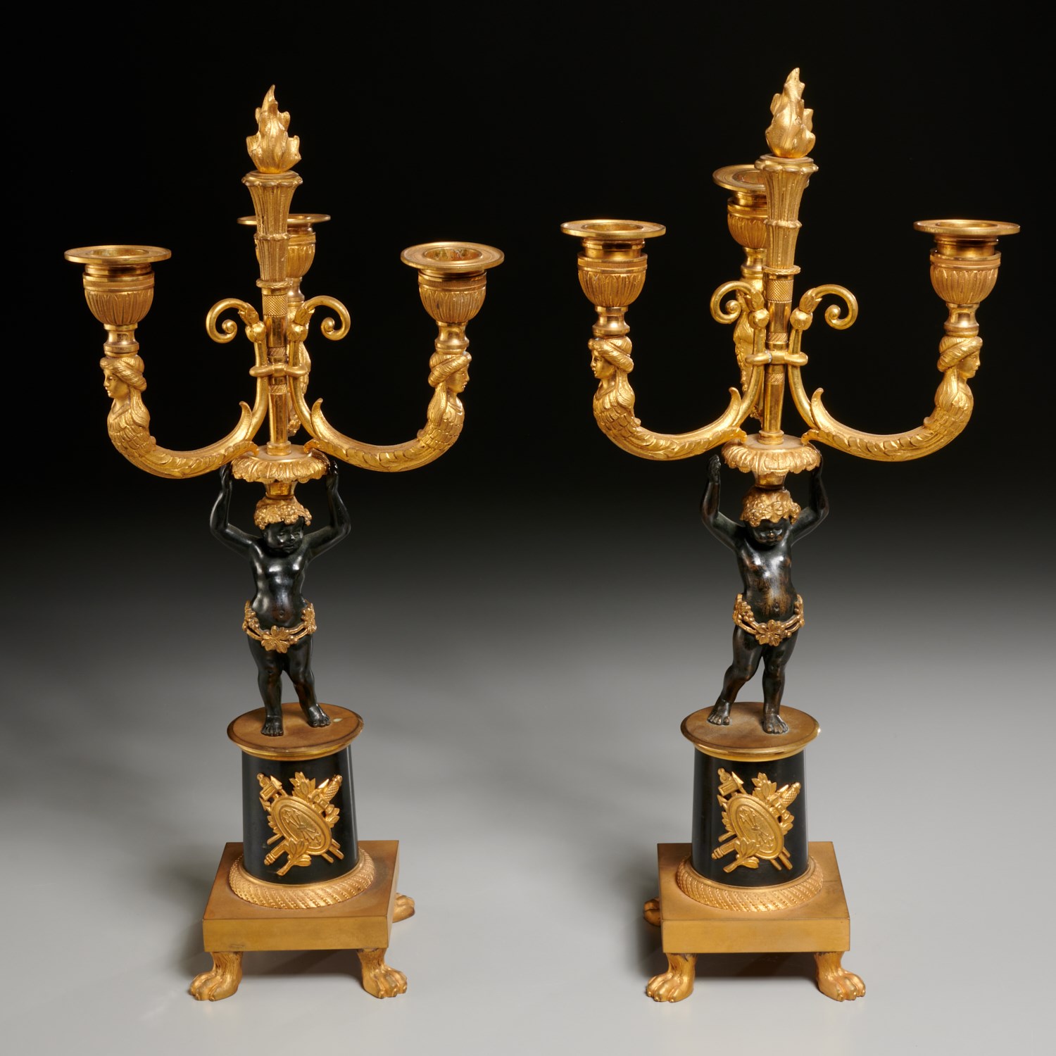 Appraisal: PAIR AUSTRIAN NEOCLASSICAL GILT BRONZE CANDELABRA th th c each