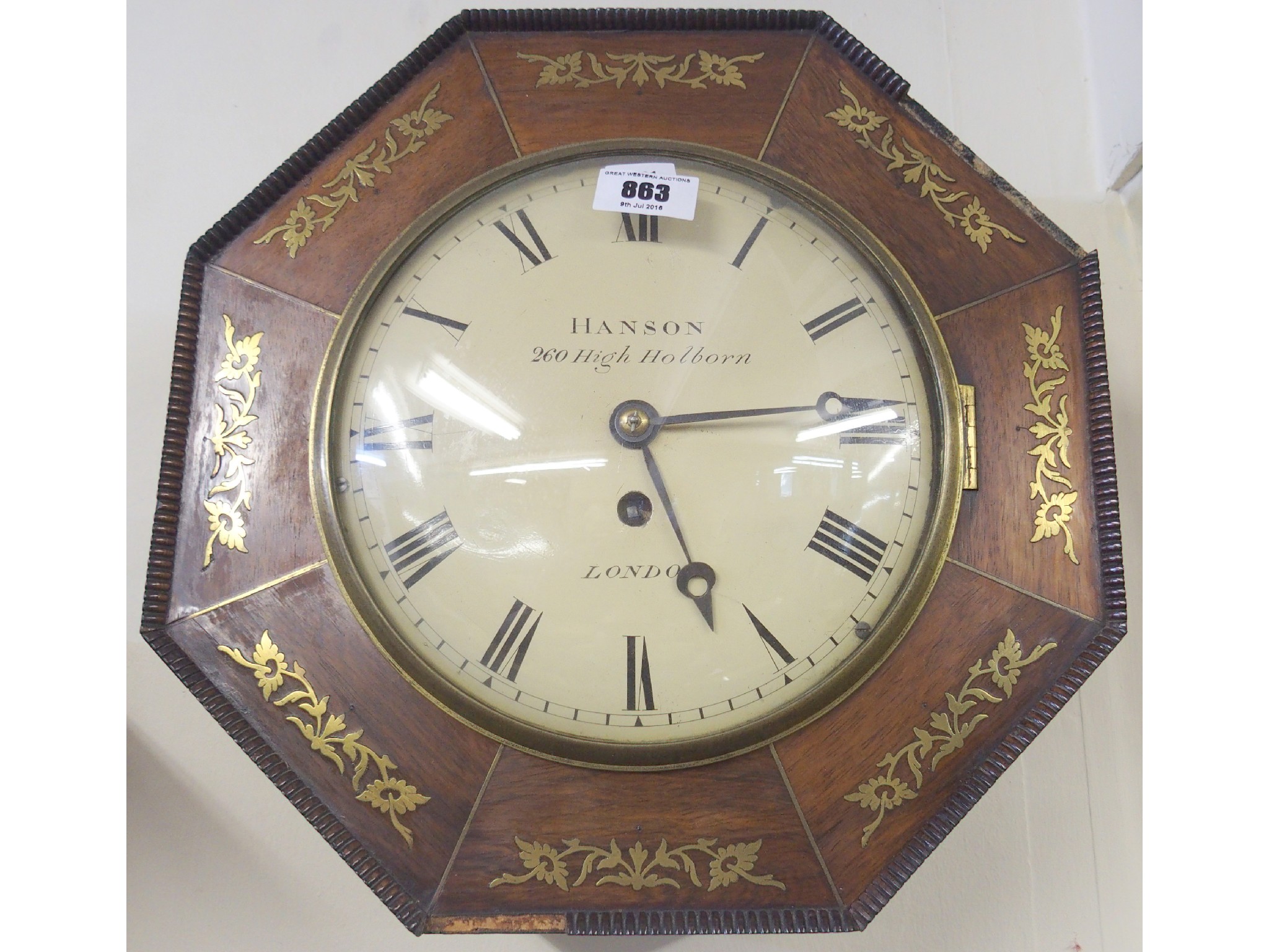 Appraisal: A brass inlaid Victorian rosewood octagonal wall clock by Hanson