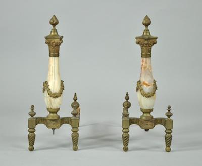 Appraisal: A Pair of Antique Andirons The pair are made from