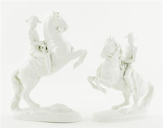 Appraisal: Pair Vienna porcelain horse and rider figurines white glaze featuring