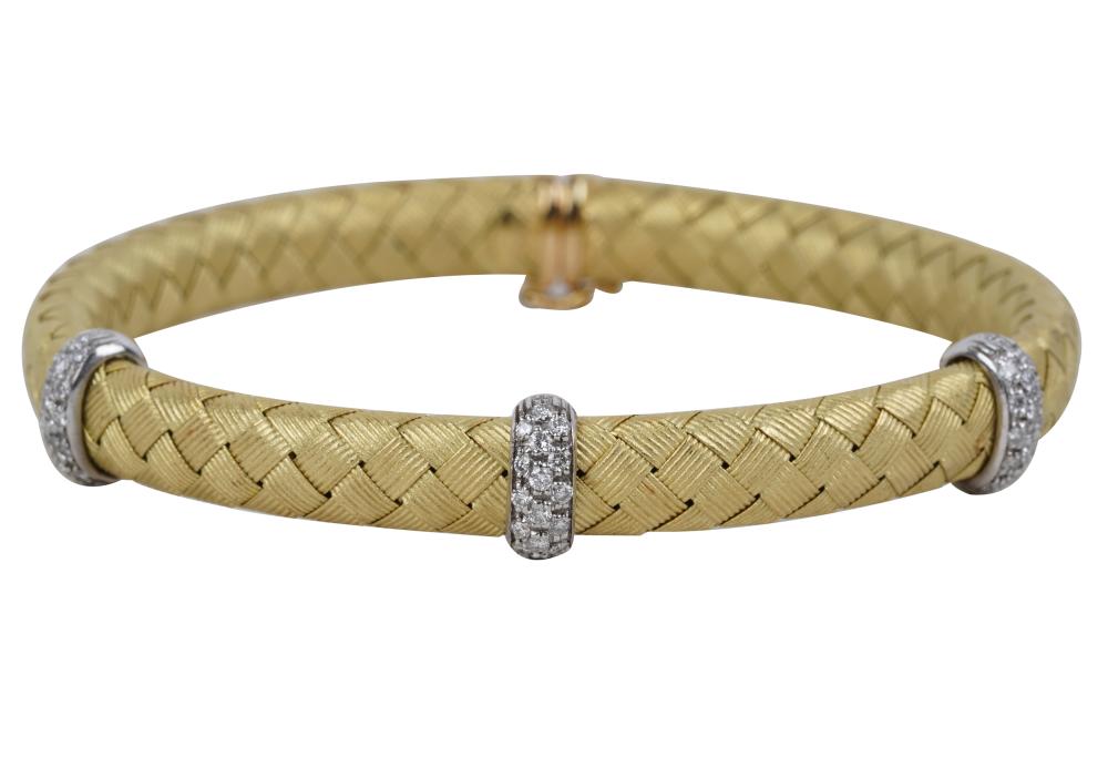 Appraisal: KARAT YELLOW GOLD DIAMOND WOVEN BRACELETcontaining full cut diamonds H-I