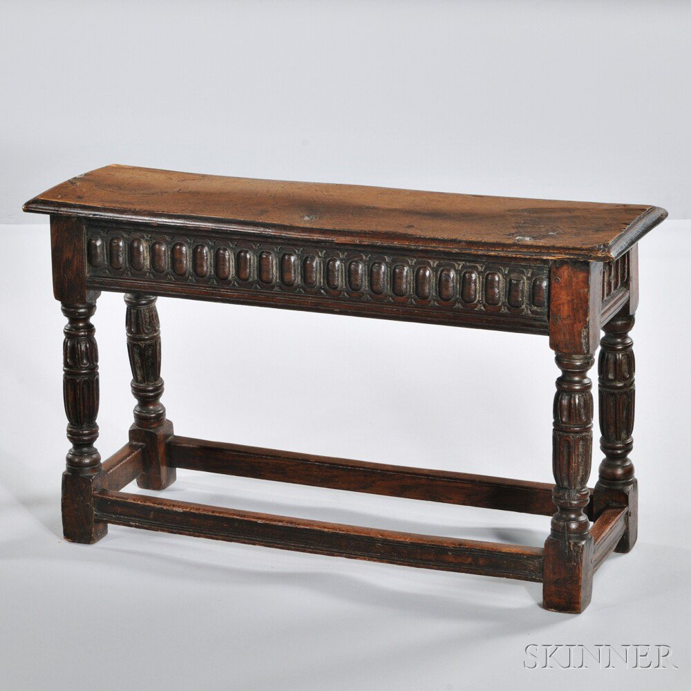 Appraisal: Carved Oak Bench th th century with a narrow seat