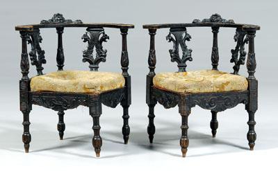 Appraisal: Pair baroque style carved corner chairs each with central carved