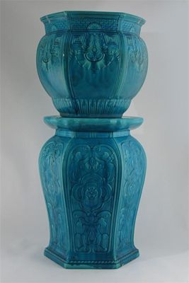 Appraisal: A Minton jardiniere and stand modelled in low relief with