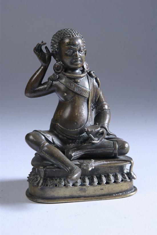 Appraisal: TIBETAN BRONZE FIGURE OF MILAREPA th century The yogi seated