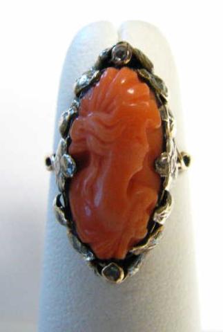 Appraisal: Lady's K two-tone antique carved coral ring size