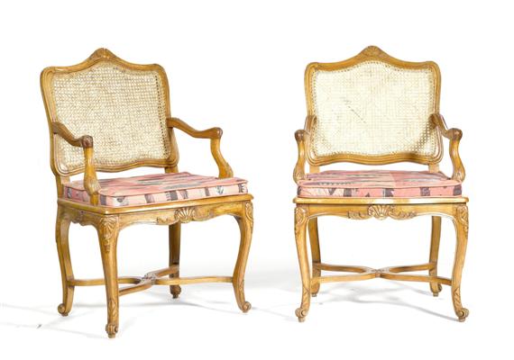 Appraisal: A PAIR OF ARMCHAIRS LA REINE R gence style France