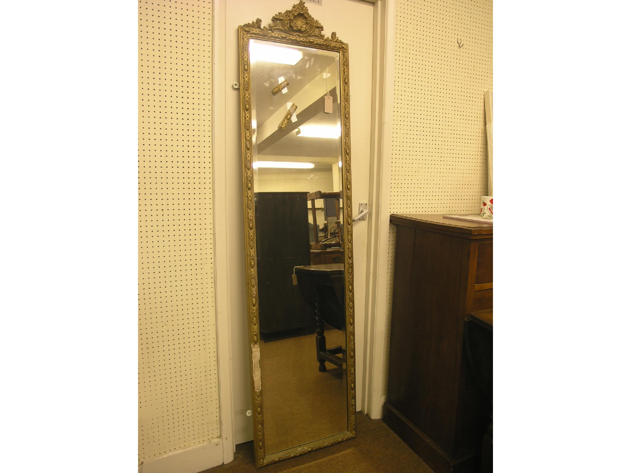 Appraisal: A large Victorian moulded gilt robing mirror with bevelled plate