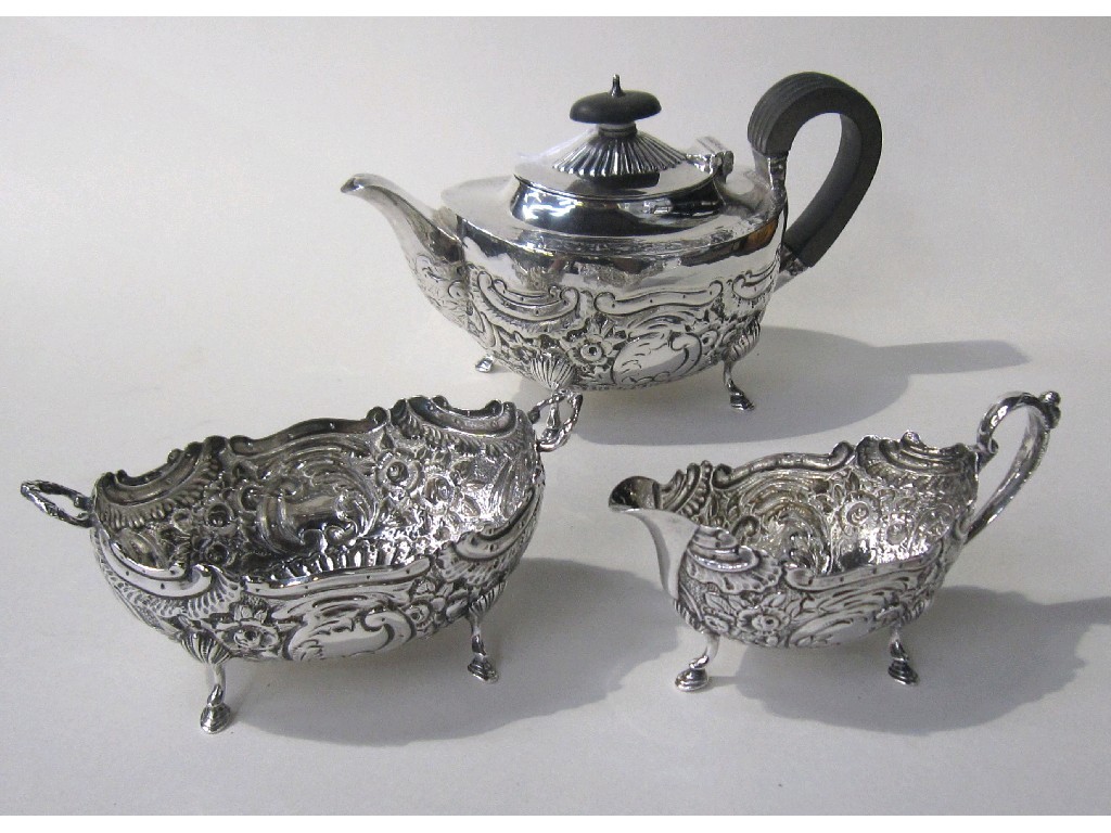 Appraisal: Embossed silver bachelors three piece tea service oz Sheffield