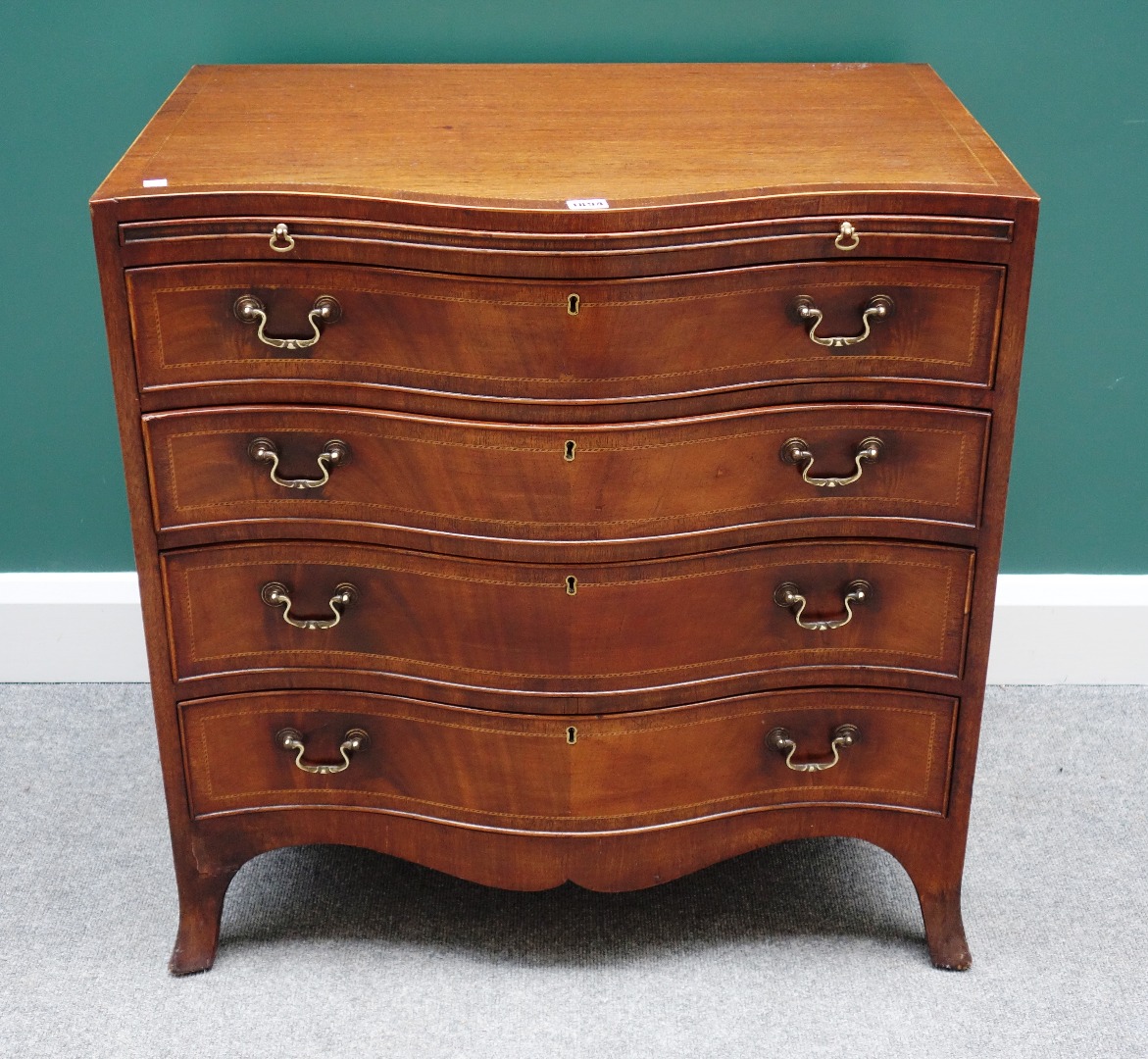 Appraisal: An th century style mahogany chest the brushing slide over