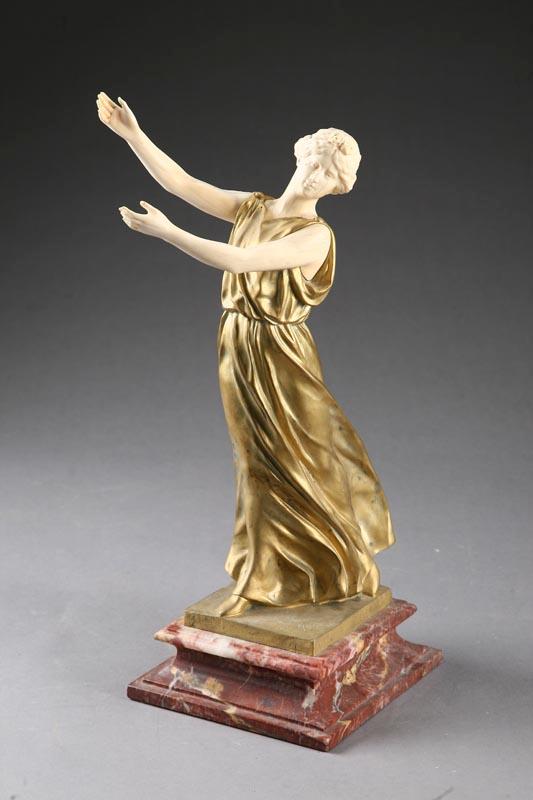 Appraisal: BRONZE AND IVORY SCULPTURE OF A DANCING LADY EARLY TH