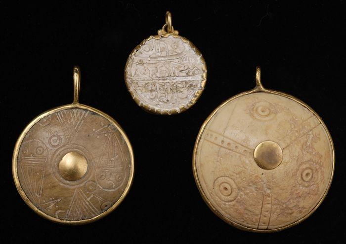 Appraisal: TWO PERSIAN-STYLE PENDANTS TOGETHER WITH AN ISLAMIC-STYLE PENDANT to in