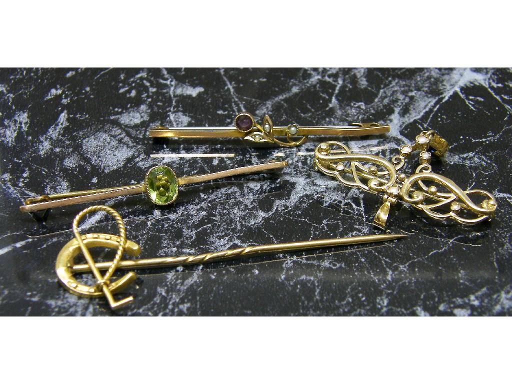 Appraisal: ct stick pin and three ct stone set brooches gm