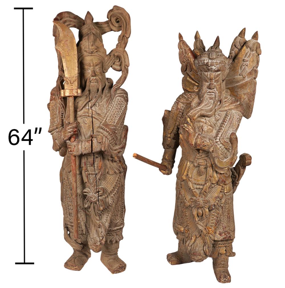 Appraisal: TWO TH C LARGE CARVED WOOD CHINESE WARRIORSTwo th C