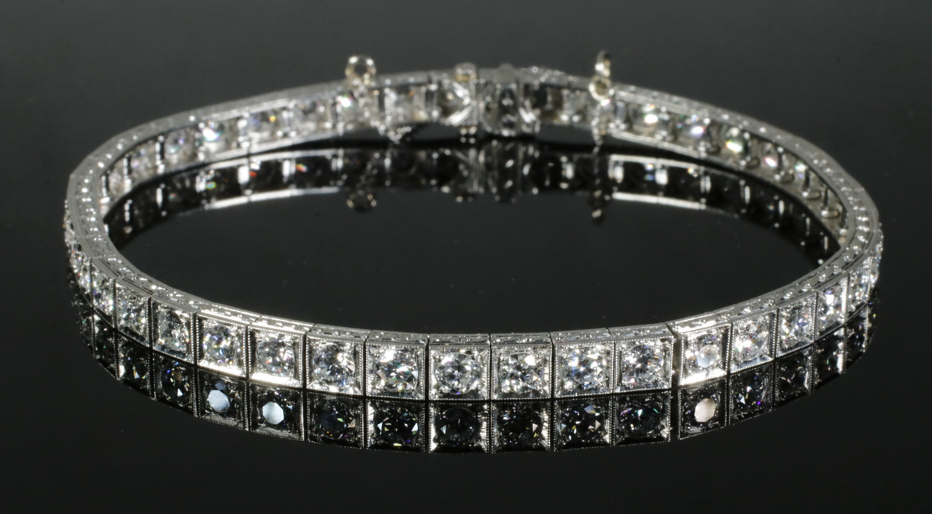 Appraisal: DIAMOND LINE BRACELET Vintage handmade Platinum Iridium Diamond line link