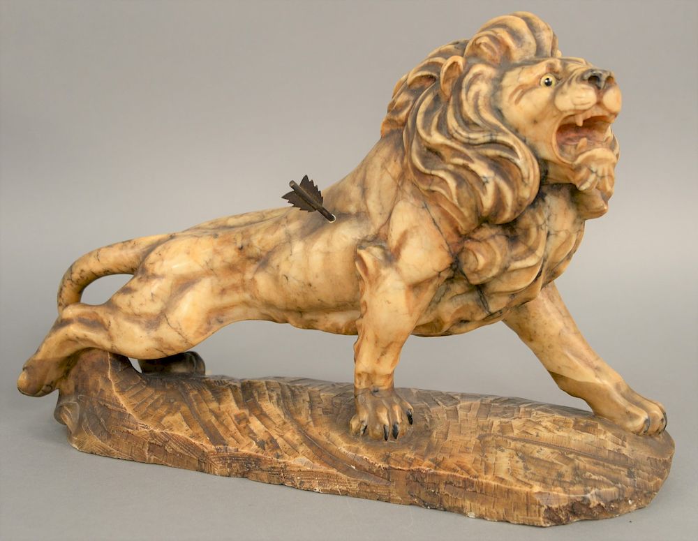 Appraisal: Large marble figure of a lion with arrow in its