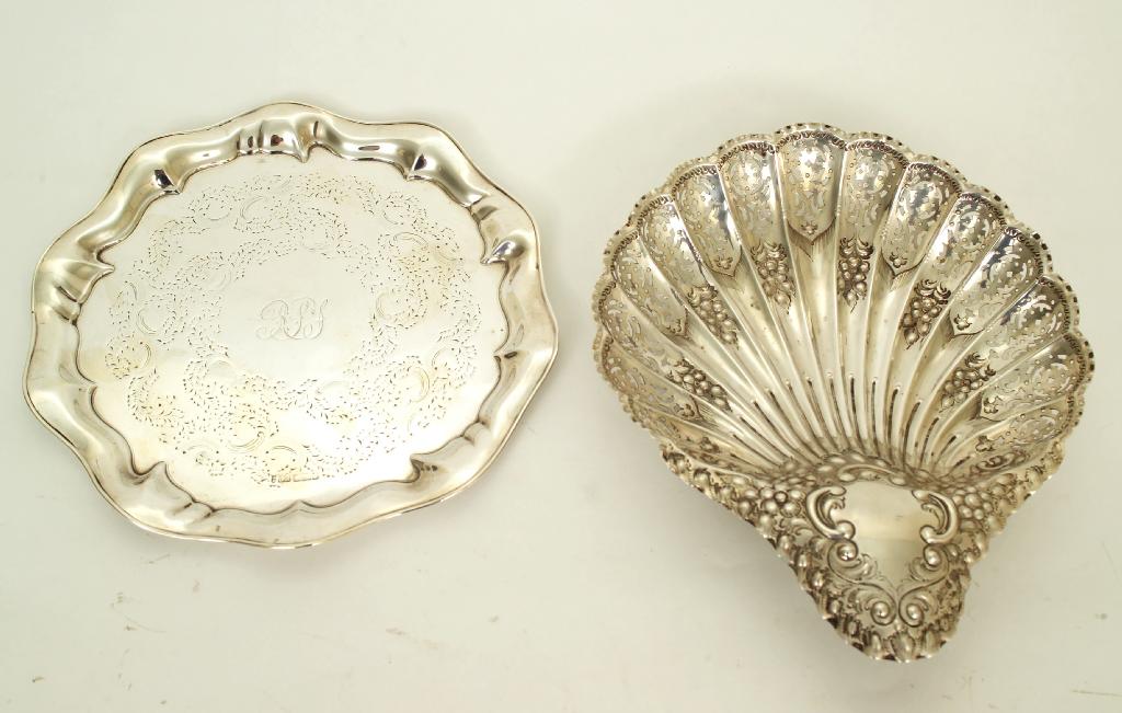 Appraisal: EDWARDIAN SILVER PIERCED DISH SHEFFIELD of shell-form chased and engraved