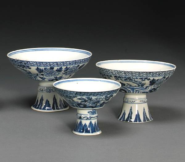 Appraisal: A group of three blue and white porcelain footed stem