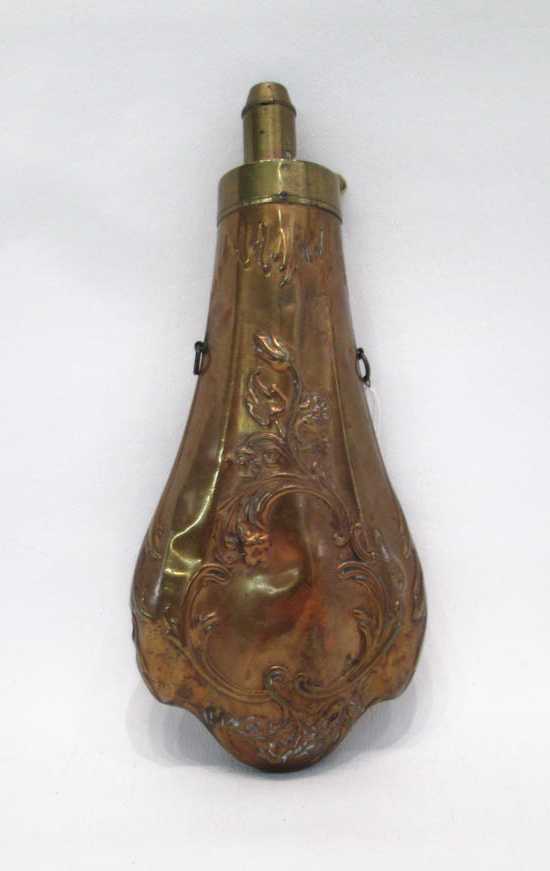 Appraisal: A BRITISH COPPER AND BRASS BLACK POWDER FLASK having a