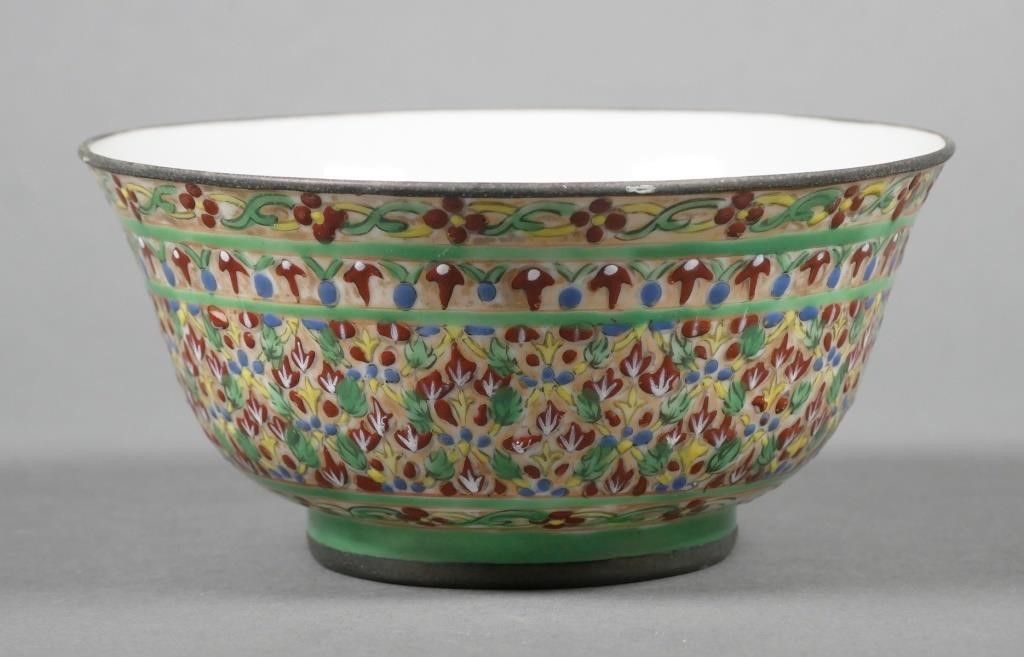 Appraisal: Bowl has a brightly painted floral motif in gold red