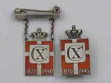 Appraisal: Two enamel on silver patriotic badges by Georg Jensen c