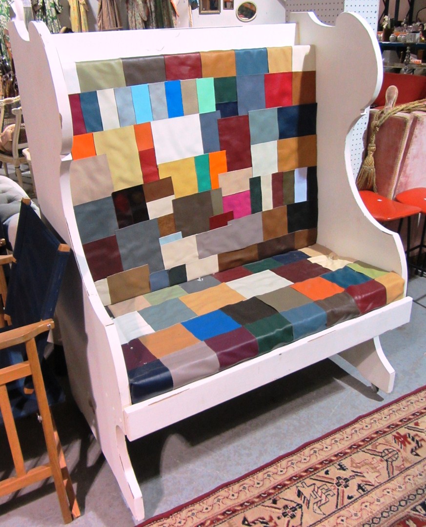 Appraisal: A th century white painted settle with multicoloured leather seat