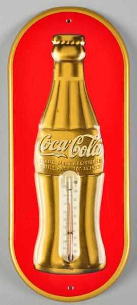 Appraisal: Embossed Tin Coca-Cola Thermometer Small area of rust around the