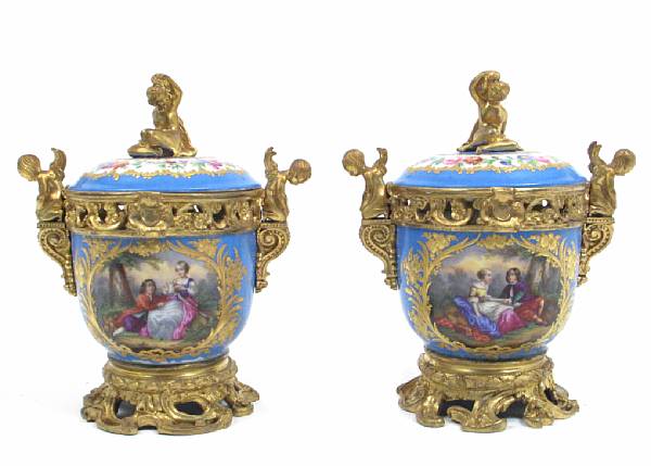 Appraisal: A pair of Sevres style porcelain gilt bronze mounted covered