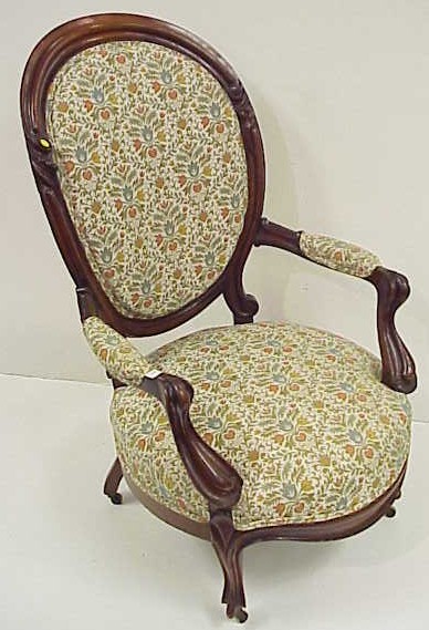 Appraisal: Victorian oval back armchair floral tapestry upholstery on casters