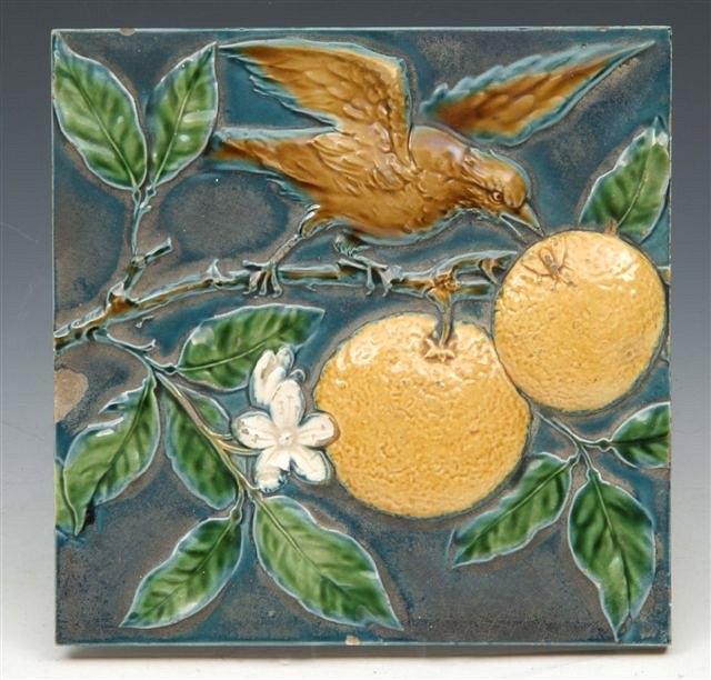 Appraisal: A MINTON HOLLINS CO RELIEF MOULDED TILE of a bird