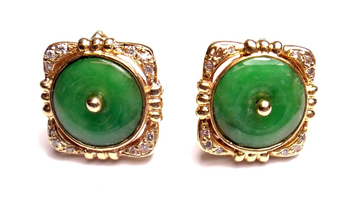 Appraisal: A pair of gold jade and diamond set earrings each