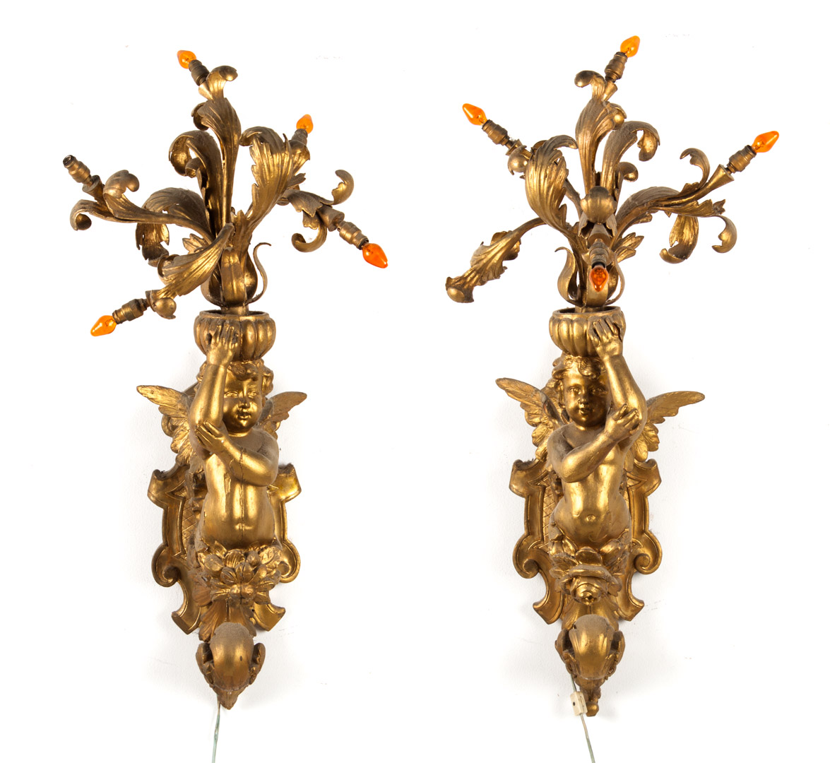 Appraisal: Pair Rococo style giltwood putti sconces second half- th century