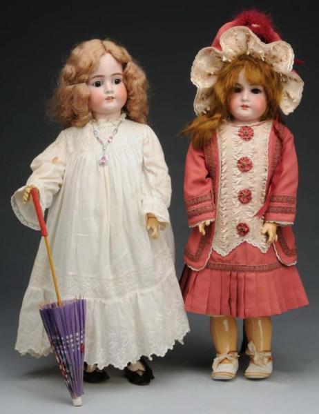 Appraisal: Lot of German Bisque Dolls Description Germany Ca Armand Marseille