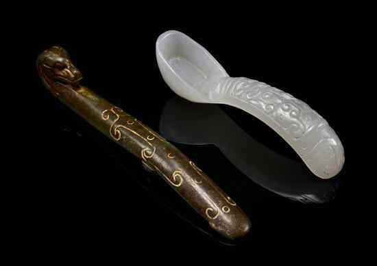 Appraisal: A Jade Belthook and a Lavender Jade Spoon the hook