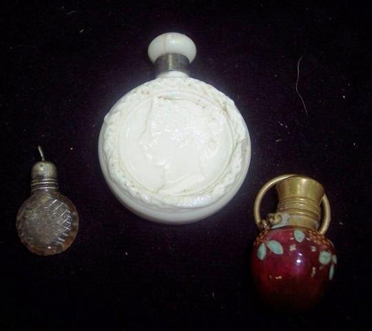 Appraisal: A Victorian opaque glass scent bottle circular with a bust