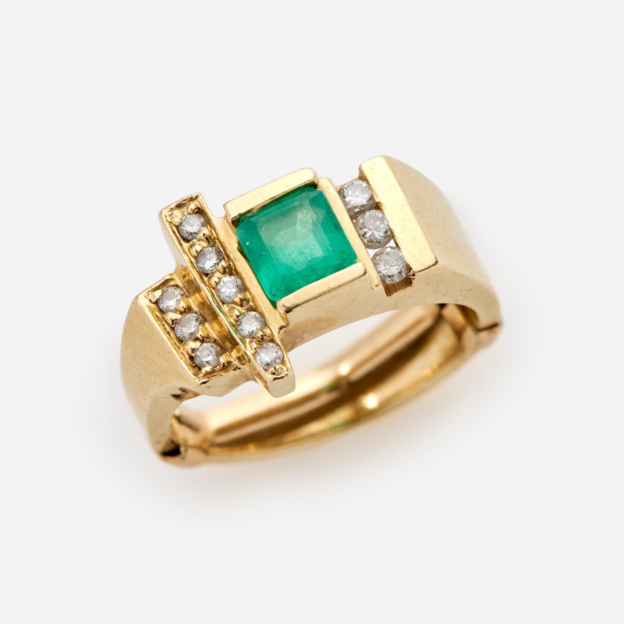 Appraisal: ASYMMETRICAL EMERALD AND DIAMOND RING IN K An asymmetrical k