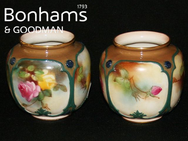 Appraisal: A pair of Hadley Royal Worcester posy vases delicately painted