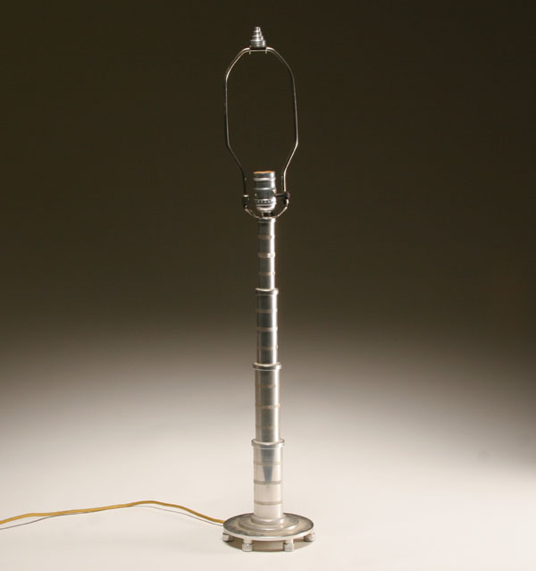 Appraisal: Machine Age aluminum skyscraper lamp graduated cylinders with vertical etching