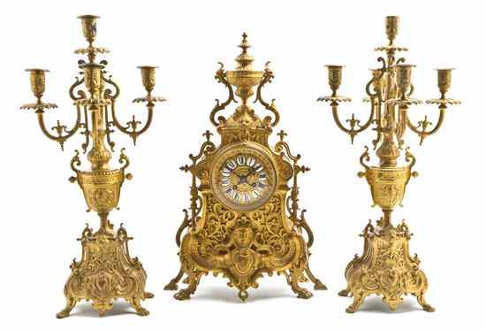 Appraisal: A French Neoclassical Gilt Bronze Clock Garniture the clock with