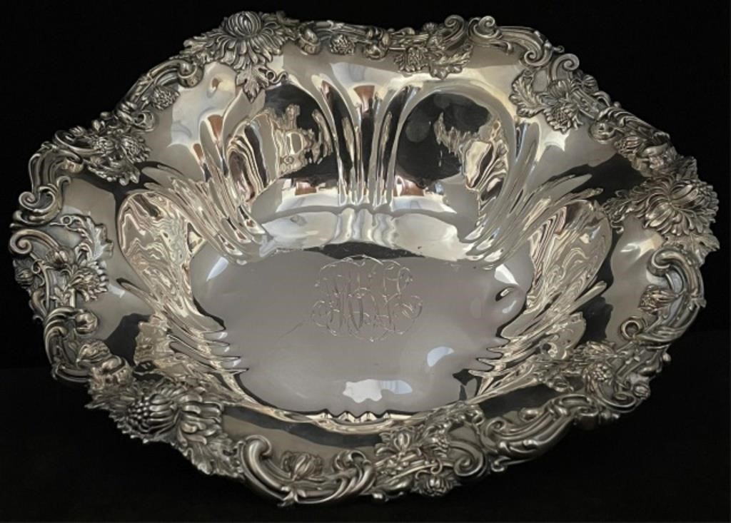 Appraisal: STERLING SILVER BOWL WITH EMBOSSED CHRYSANTHEMUMborder by Graff Washbourne Dunn