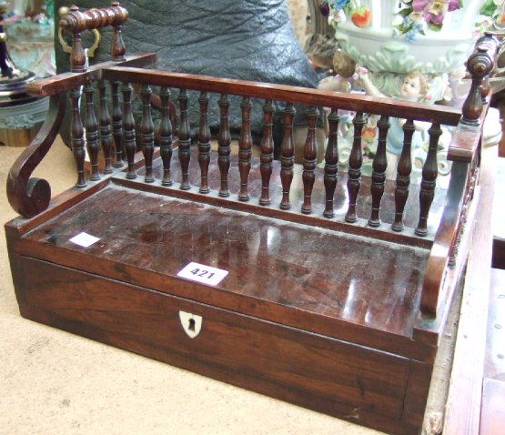 Appraisal: A th century rosewood table top book stand with spindle