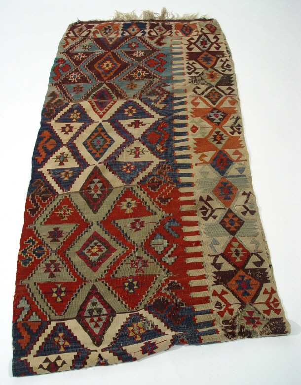 Appraisal: Carpet runner with multi-coloured geometric decoration cm x cm