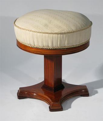 Appraisal: An Art Deco satinwood dressing table stool with circular seat