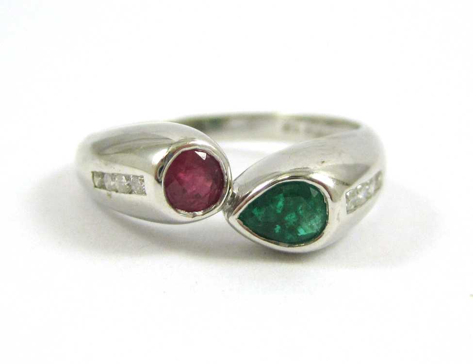 Appraisal: RUBY EMERALD AND FOURTEEN KARAT GOLD RING The white gold