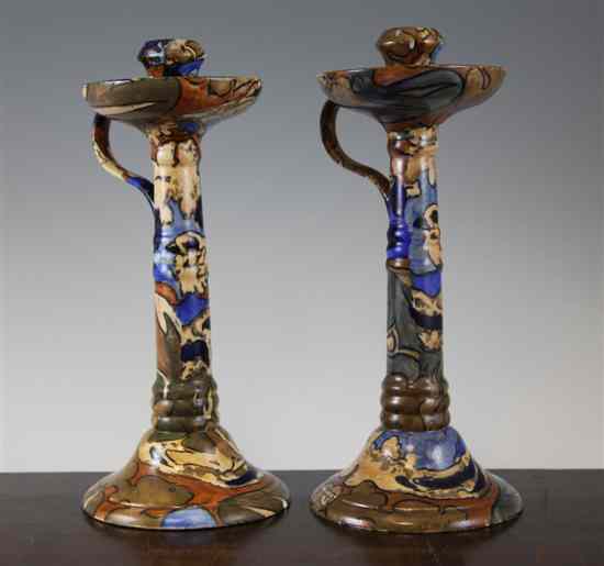 Appraisal: A pair of Bursley ware Amstel pattern tall candlesticks designed