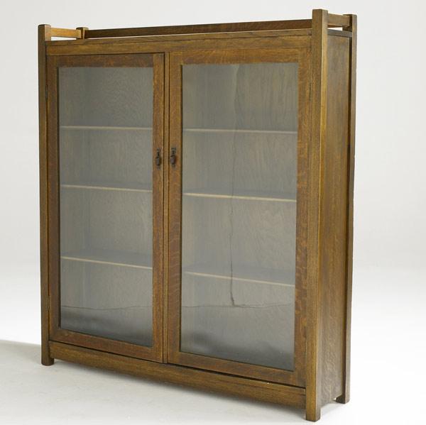 Appraisal: HARDEN Attr Double door bookcase with open glass front and